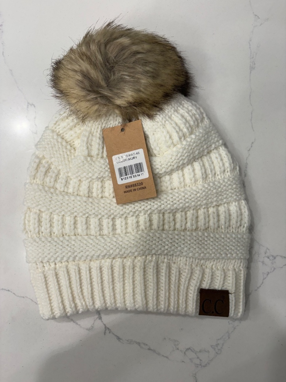 C.C Ivory Ribbed Hat With Faux Fur Pom